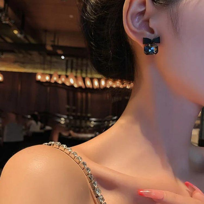 Midnight Bow Mystic Stud Earrings