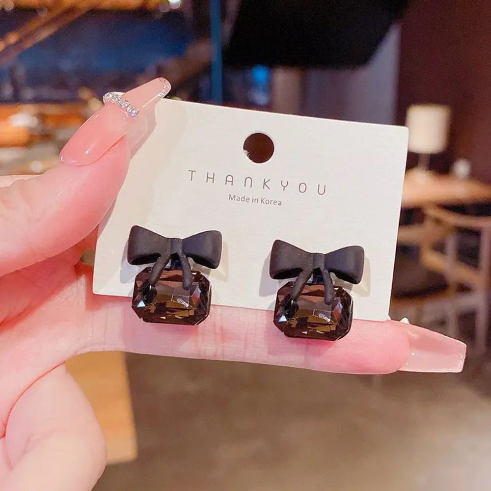 Midnight Bow Mystic Stud Earrings