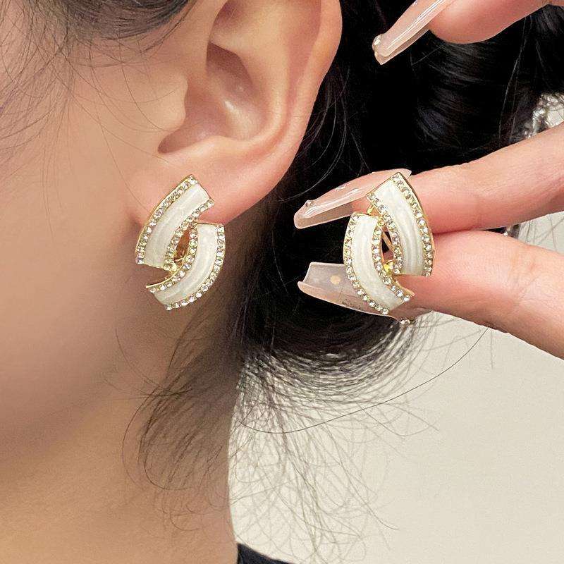 Twisted White Rhinestone Mystic Earrings