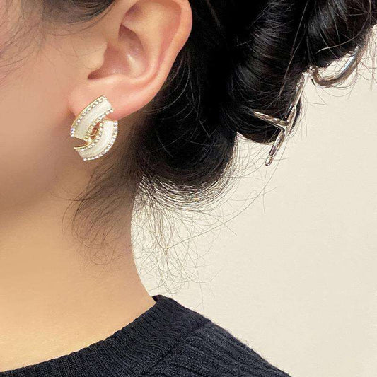 Twisted White Rhinestone Mystic Earrings