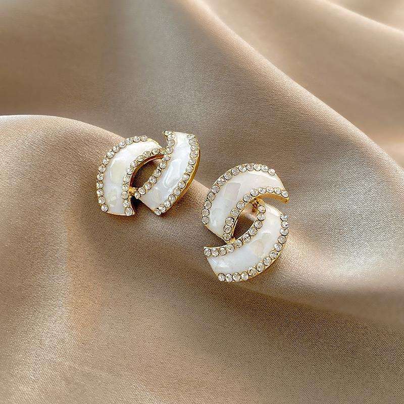 Twisted White Rhinestone Mystic Earrings